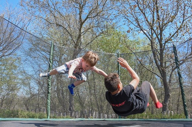 Kids Playing Fun Outdoor Jumping - best summer activities